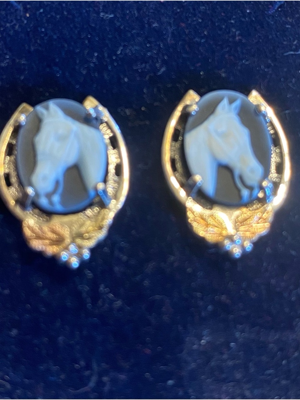 Landstroms Black Hills Gold Silver Horse Cameo Earrings with 12K Gold Leaves.